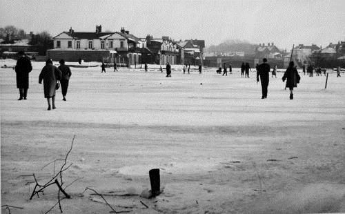 Skating on the ice on the Thames in Windsor, 1963.