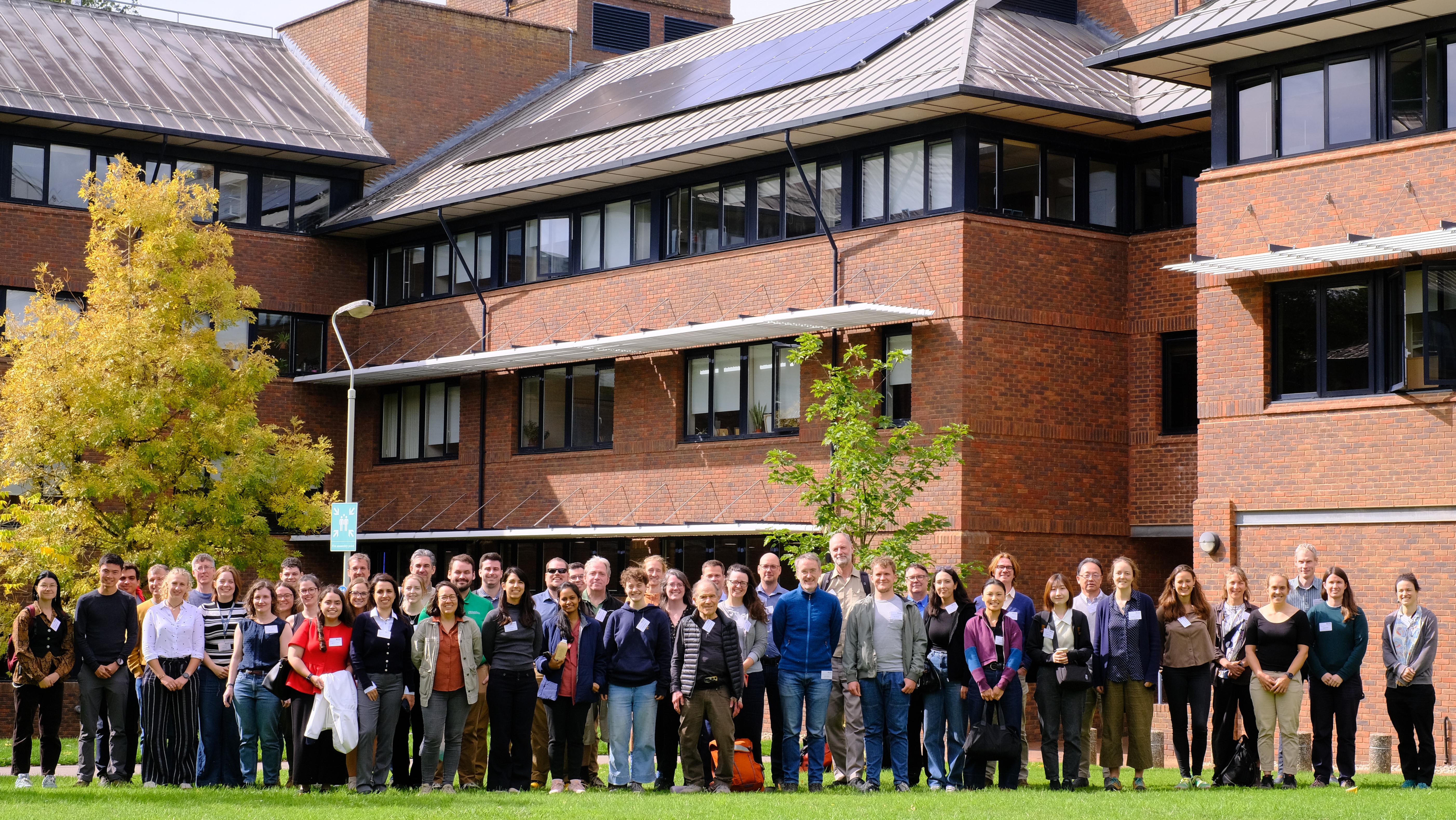A photograph of the workshop participants outside the Meteorology department